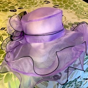 Lovely Church, Derby or Tea party hat. Purple with black trim.